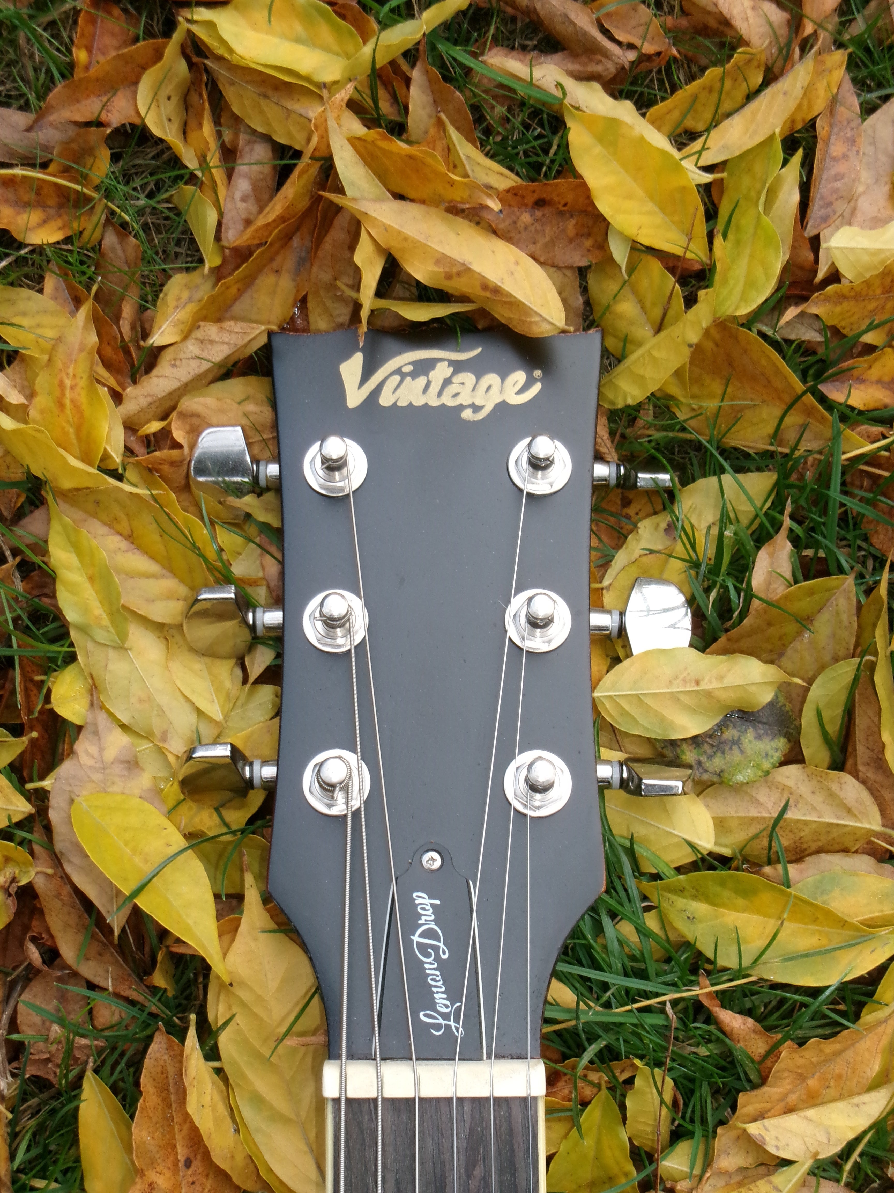 Vintage V100 ICON Electric Guitar-Distressed "Lemon Drop"